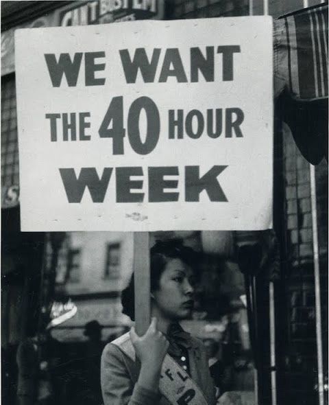 Woman protesting for the 40 hours work week.